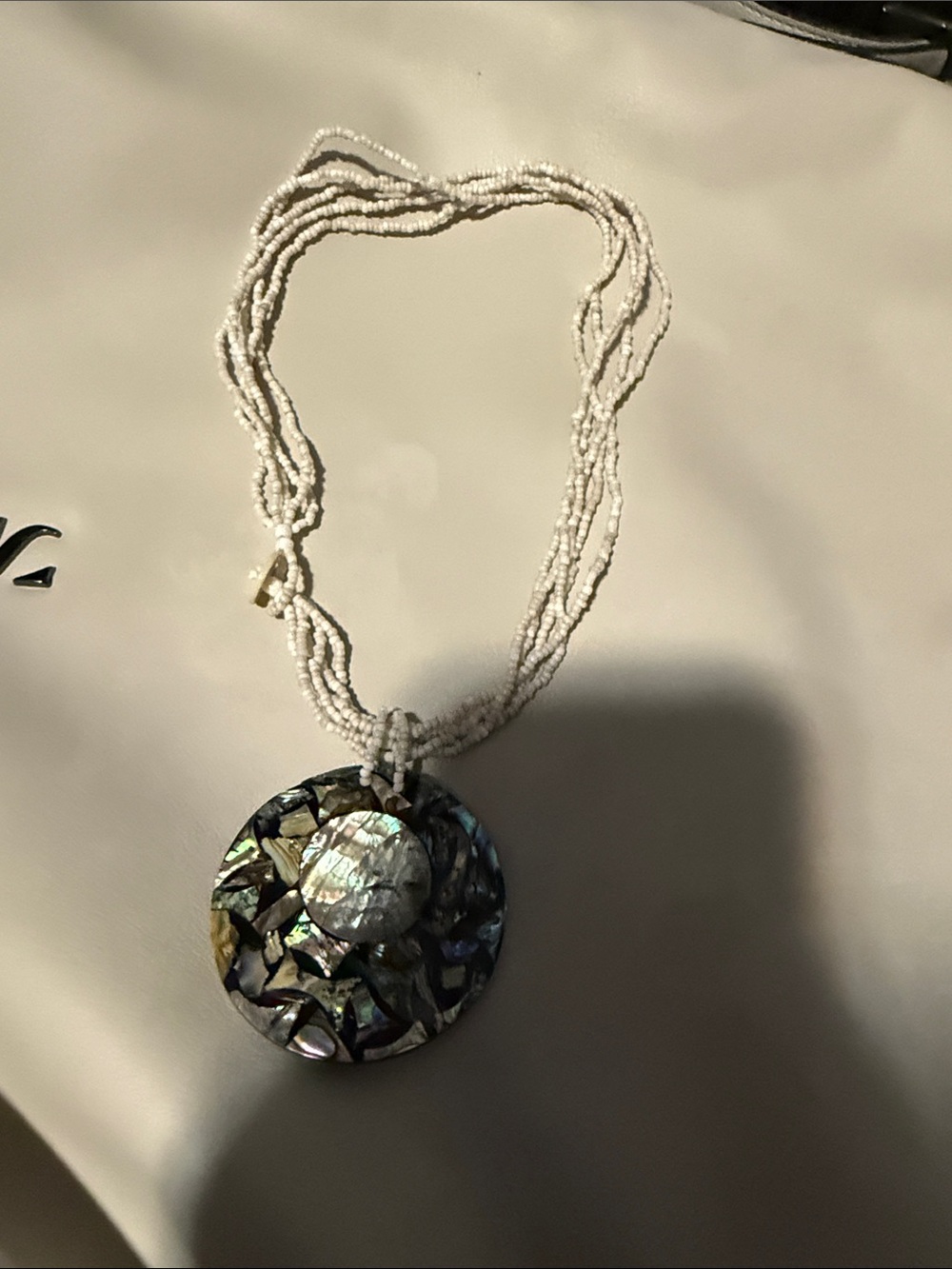 White Beaded Necklace with Iridescent Abalone Pendant